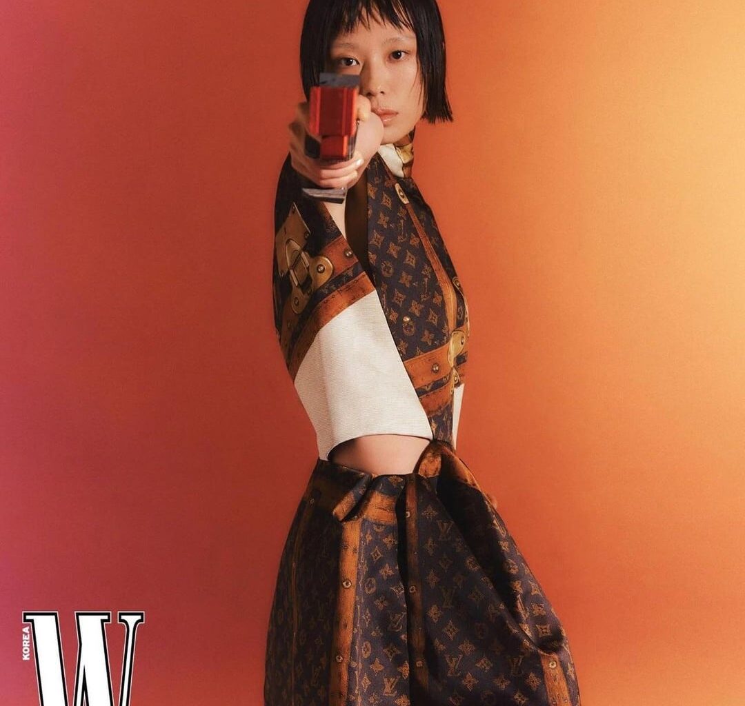 Kim Yeji of the Cyberpunk air pistol meme modeling Louis Vuitton for W Korea magazine