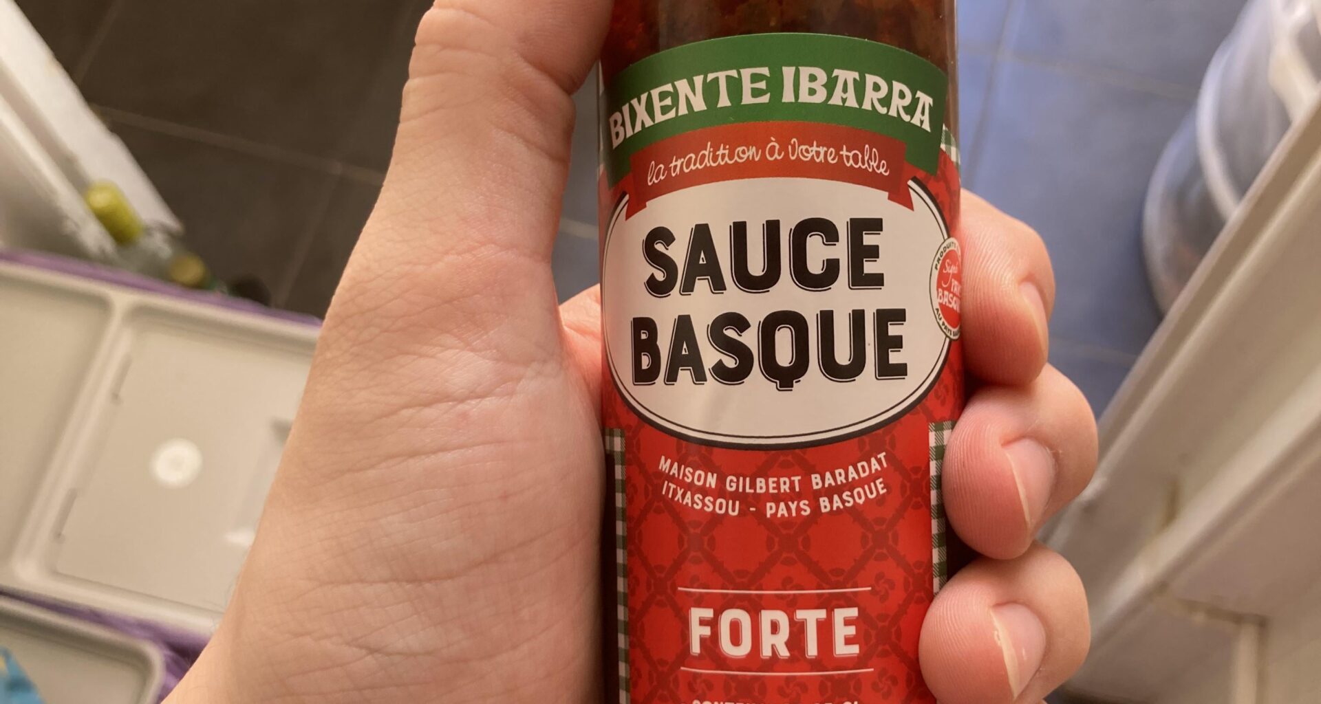 My sister who lives in France brought me some stuff, including this… sauce. She does not know much about it. What does it taste like? What does it go with? There’s an oil and a sludgy part, do I need to shake it before using? It was near impossible to shake enough to combine