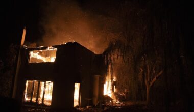 A fast-advancing wildfire near Greek capital Athens darkens skies