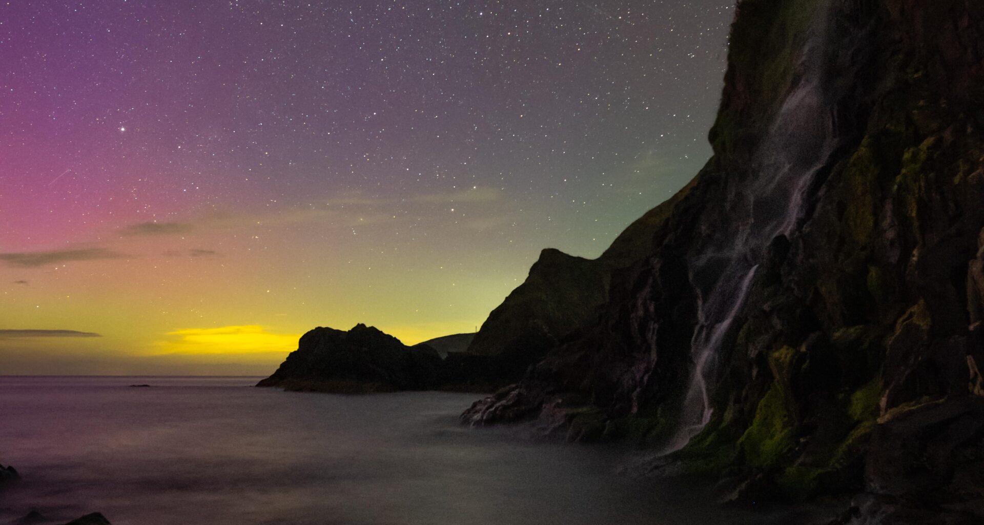 Monday nights Aurora glow from Tresaith Waterfall. West Wales.