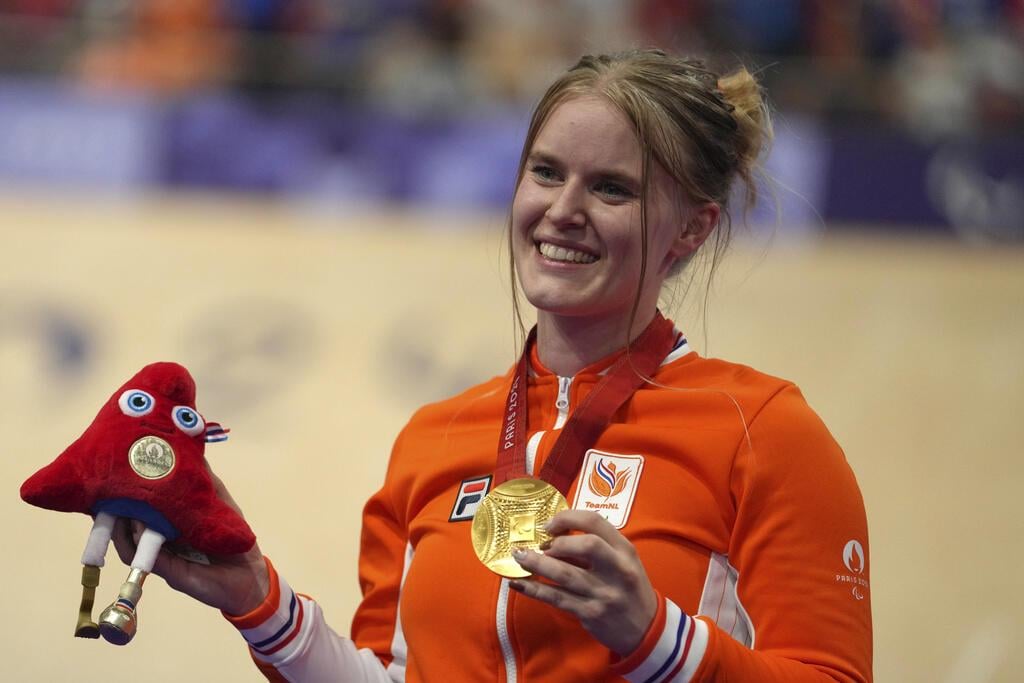 Track cyclist Caroline Groot of the Netherlands won the first gold medal of the Paralympic Games