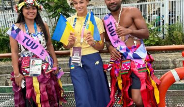 Ukrainian judoka Daria Bilodid posed for a picture with Tuvaluan athletes during the opening ceremony proceedings