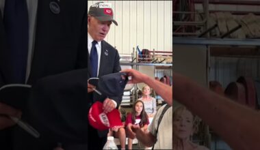 Joe Biden swaps hats with Trump supporter