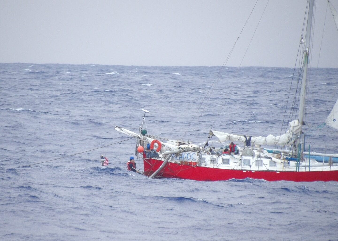 Coast Guard, Navy rescue woman, child, pets from sailboat beset by weather 925 miles off Honolulu