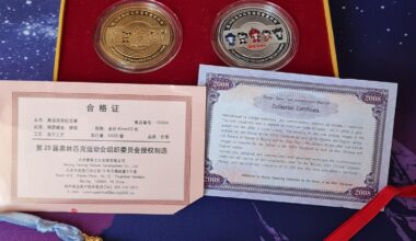 I found Beijing 2008 medallions while cleaning my drawers. Any information about them would be appreciated.