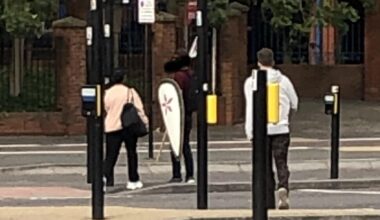 Just a chap casually carrying a pike and a shield