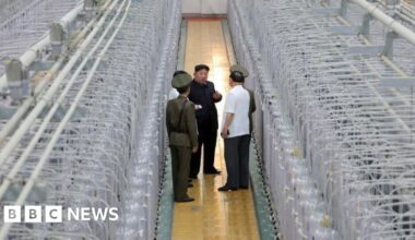 North Korea releases rare photos of Kim in nuclear facility