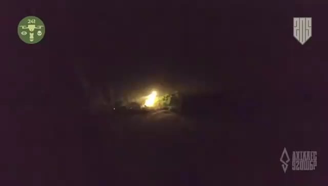 Night-time footage of another Ukrainian thermite FPV attack on Russian positions in a windbreak.