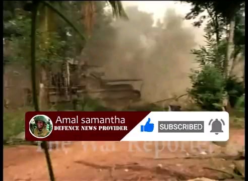 Sri Lankan 58th infantry regiment soliders protecting their tank from a ltte anti tank crew hidden in a house.(2005.12.17)