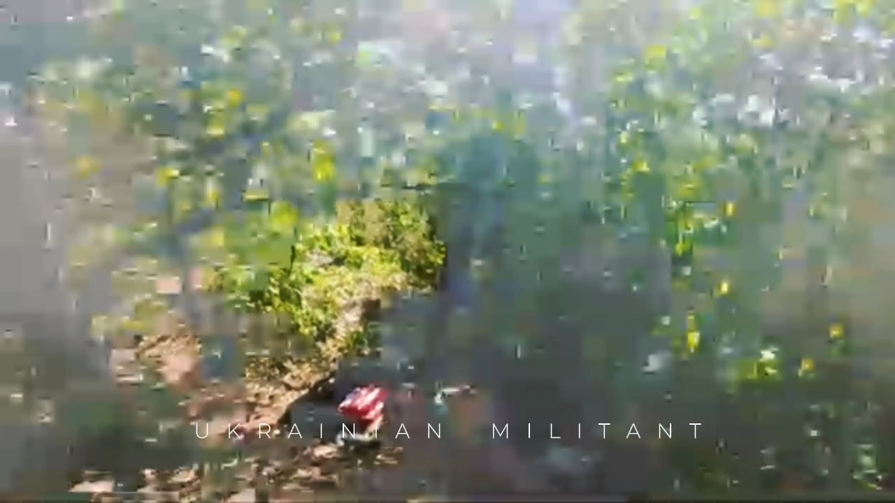 GoPro footage of an Ukrainian Border Guard who's nearly hit by Russian artillery and firing his AK and RPG rounds at Russian positions