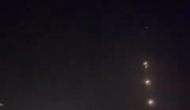 Missile barrage from Lebanon + Iron Dome interceptor launch captured in the same clip