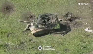 Ukrainian drone destroyed disabled T-90M with multi-story cope cage.