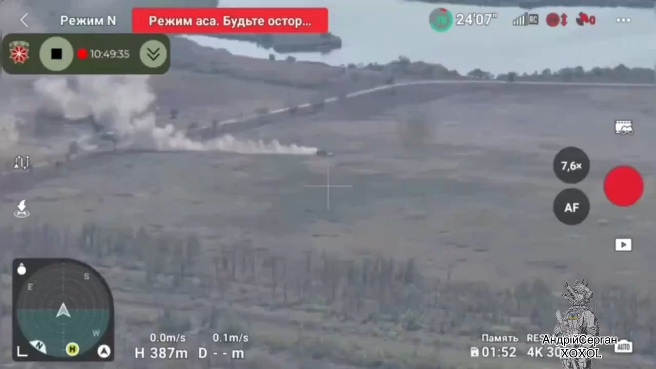 Drone footage of another Russian armored assault which stops after the lead vehicle, equipped with a mine roller, drives straight into a Ukrainian minefield and explodes.