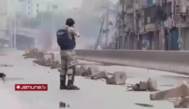 Bangladeshi police armed forces battalion using live rounds against protesters in Dhaka on 5 August 2024.