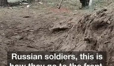 Russian soldiers going back to the front on crutches after injuries