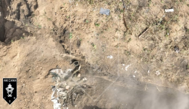 A drone operator from the 1st Assault Battalion (92 OShBr) lands an accurate drone dropped grenade strike near 3 Russians entering a dugout.