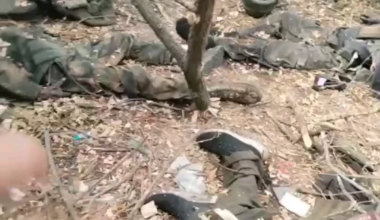 Russian Armed Forces servicemen inspect there landing strewn with the corpses of their comrades.