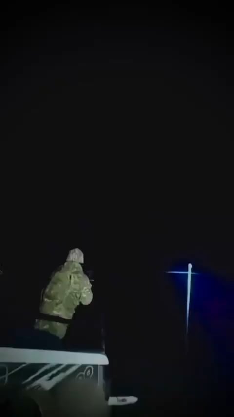 Night-time footage of Ukrainian mobile air-defense teams shooting down an Iranian Shahed-136 drone.