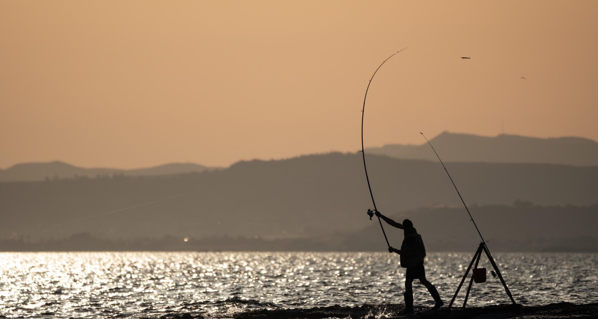 Fisherman casting his hook - Taken in Ormidia