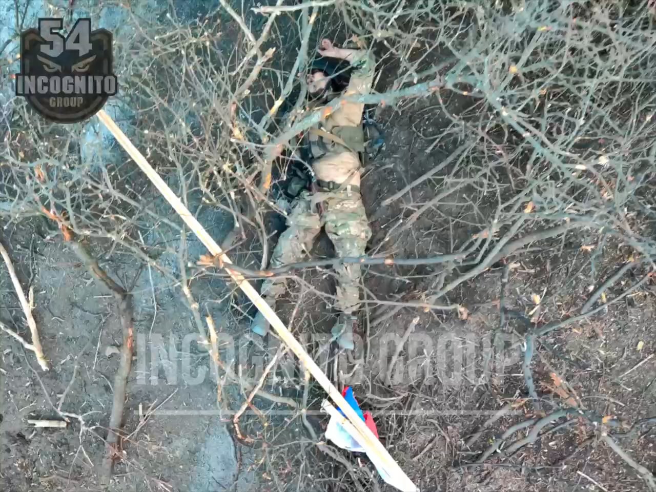 Incognito Group spots an occupier running with a Russian flag that noticed the surveillance drone and acts dead. Shortly after he gets killed.