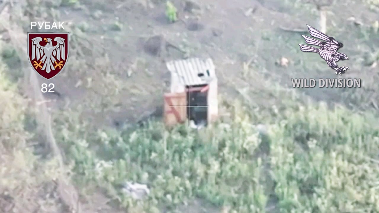 UA fpv kills a russian doing number 2. A.Russian invader finds an outhouse in a village he destroyed B. UA defenders find him in there C. Fans hit the shit