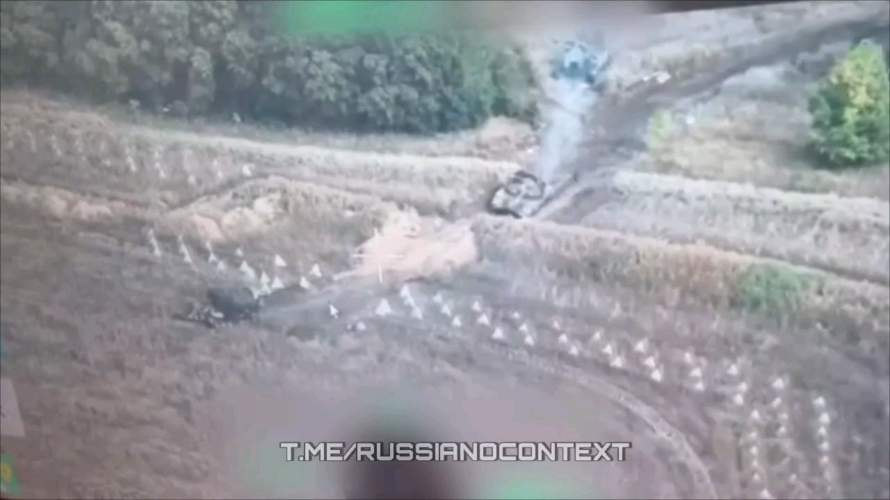 A Ukrainian engineering vehicle clears a passage of "dragon's teeth" on the border with Kursk Oblast.