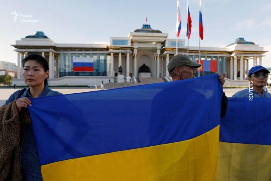 Mongolian citizens show their solidarity with Ukraine, outside the state Palace in the capital city of Ulaanbaatar, as Putin arrived in the country. September 2024