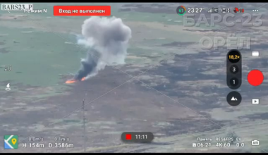 A Russian vehicle in service with the BARS-23 drives over a field and explodes on a TM-62 anti-tank mine, three survivors start running, Vuhledar direction