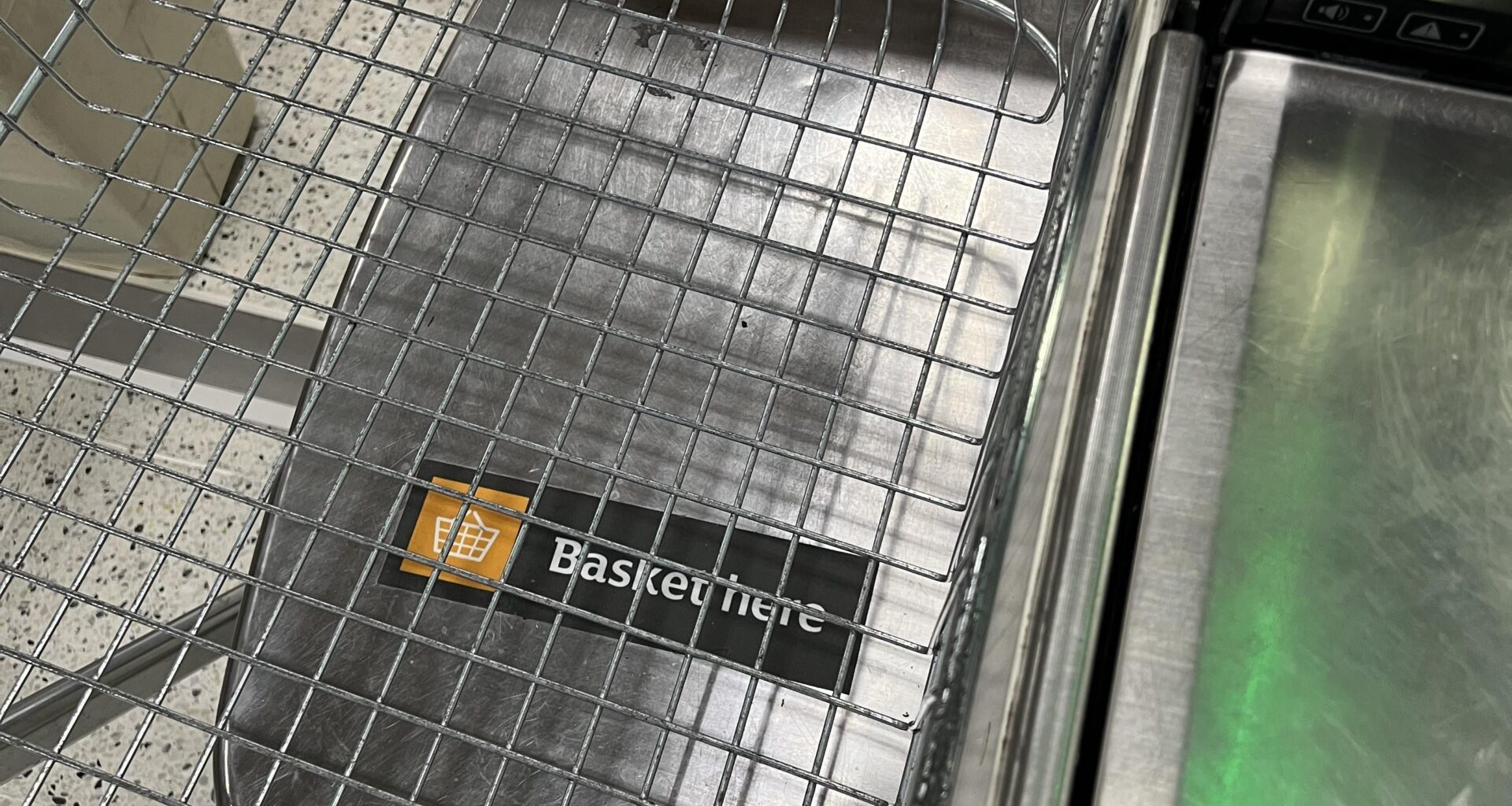 TIL: the trolley at Sainsbury’s can be parked over the basket shelf at self checkout