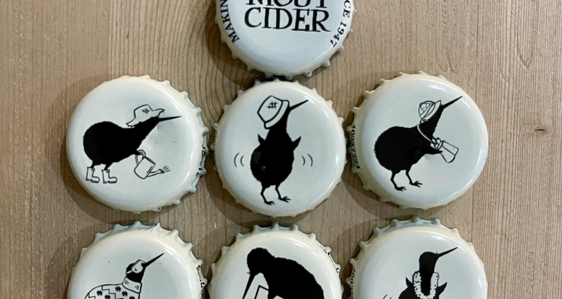 The Kiwis on the Old Mout Cider bottle tops are all doing different things…