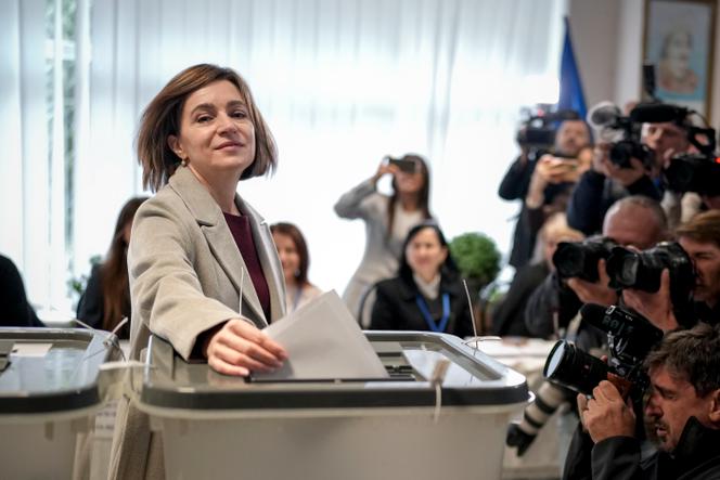 Moldovan President Maia Sandu casts her vote for the presidential election and the referendum on enshrining the country's path to European Union membership in the Constitution, in Chisinau, Moldova, on October 20, 2024.