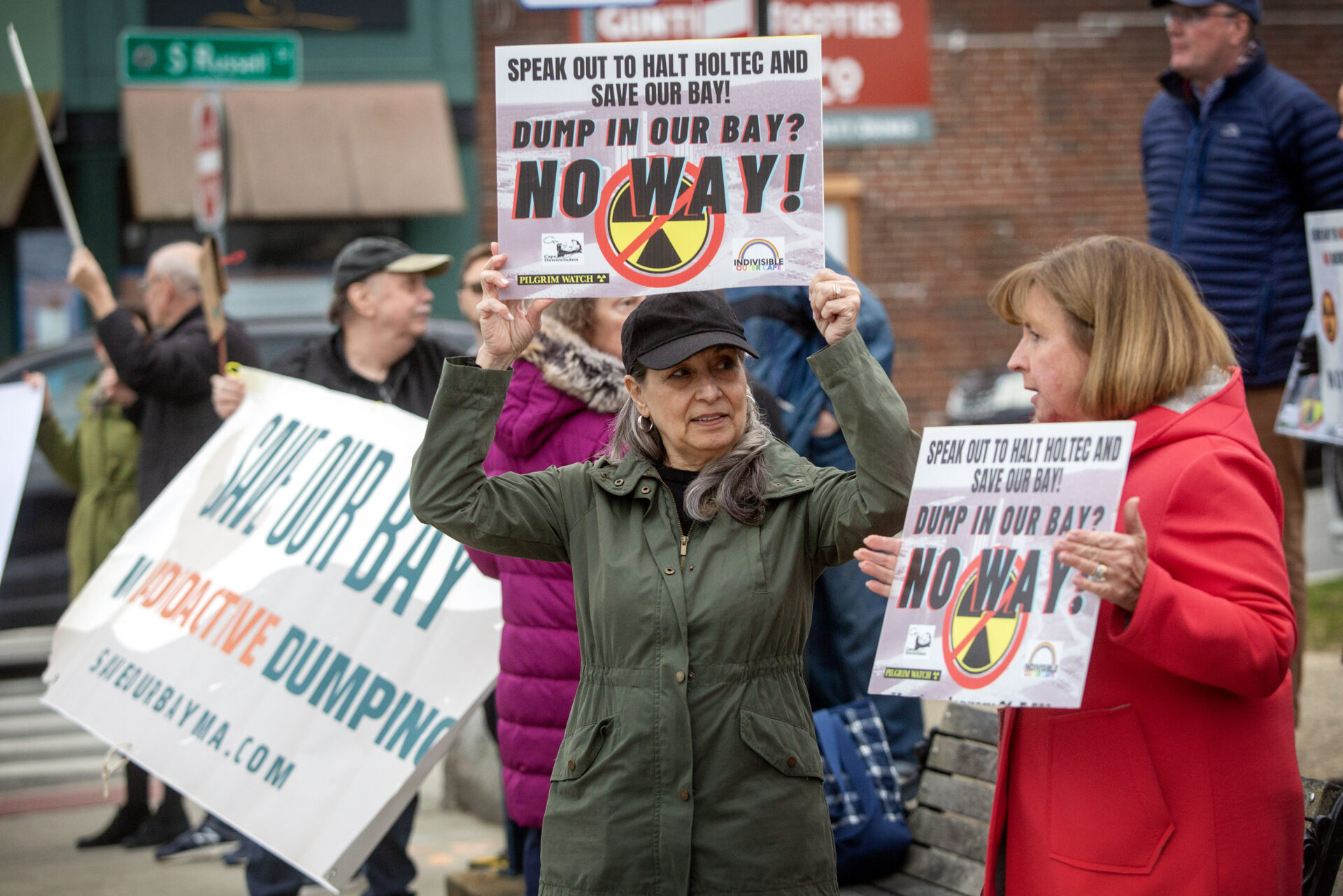 Protestors outside Plymouth Town Hall. (Robin Lubbock/WBUR)