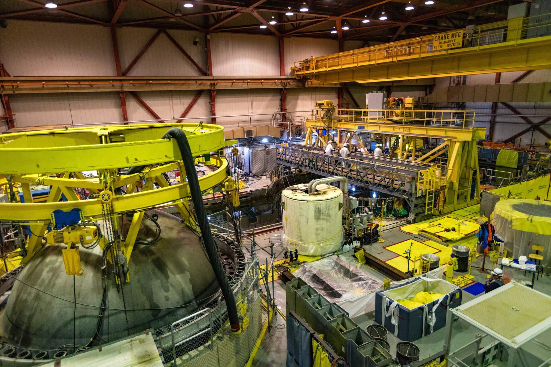 A decommissioning crew works on the top floor of the Pilgrim Nuclear Power Station reactor where wastewater is being held in the spent fuel pool and the dryer separator pit. (Jesse Costa/WBUR)