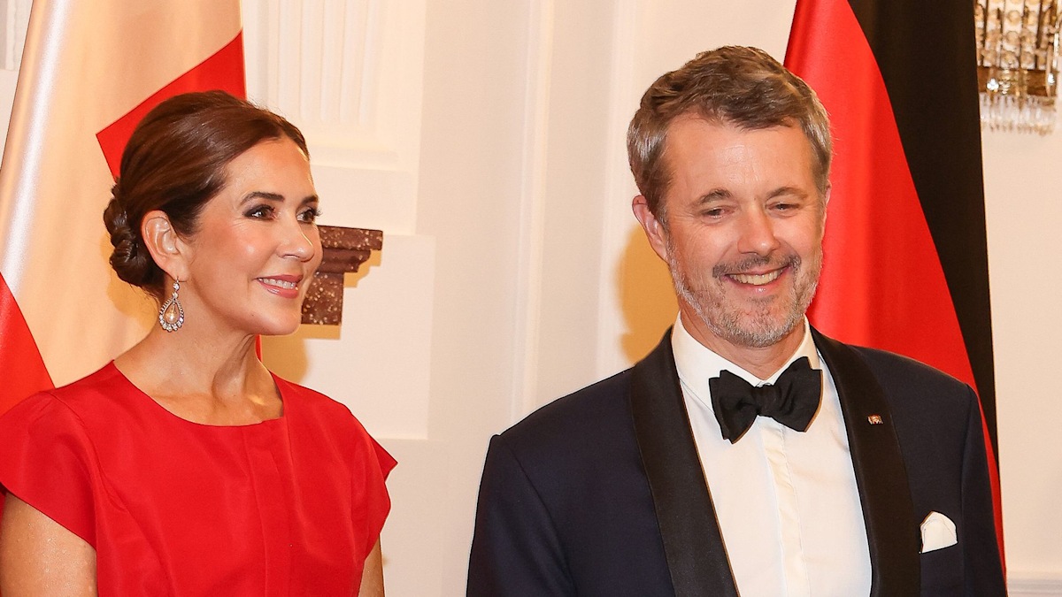 Queen Mary of Denmark is a satin dream in royal red ballgown