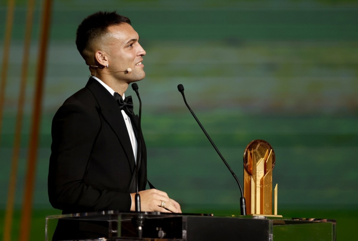 Argentine and Inter forward Lautaro Martinez presents the Yashin Trophy for the best goalkeeper at the Ballon d