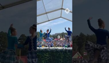 Competitors in action at the Braemar Gathering highland games