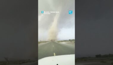 🌪️ Dust #tornado swirls, lightning bolts strike near road in the #unitedarabemirates