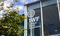 view of the headquarters of the Internet Watch Foundation with its logo in white on a large glass window