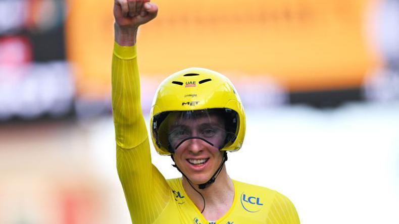 Tadej Pogacar of UAE Team Emirates  crosses the finish line during the 2024 Tour de France.