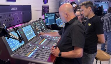 Field marketing engineer Russ Long (foreground) demonstrates the Yamaha Rivage PM10 live mixing console inside Yamaha’s new Nashville demo space.