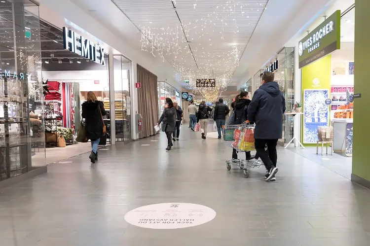 People shopping in a modern shopping centre