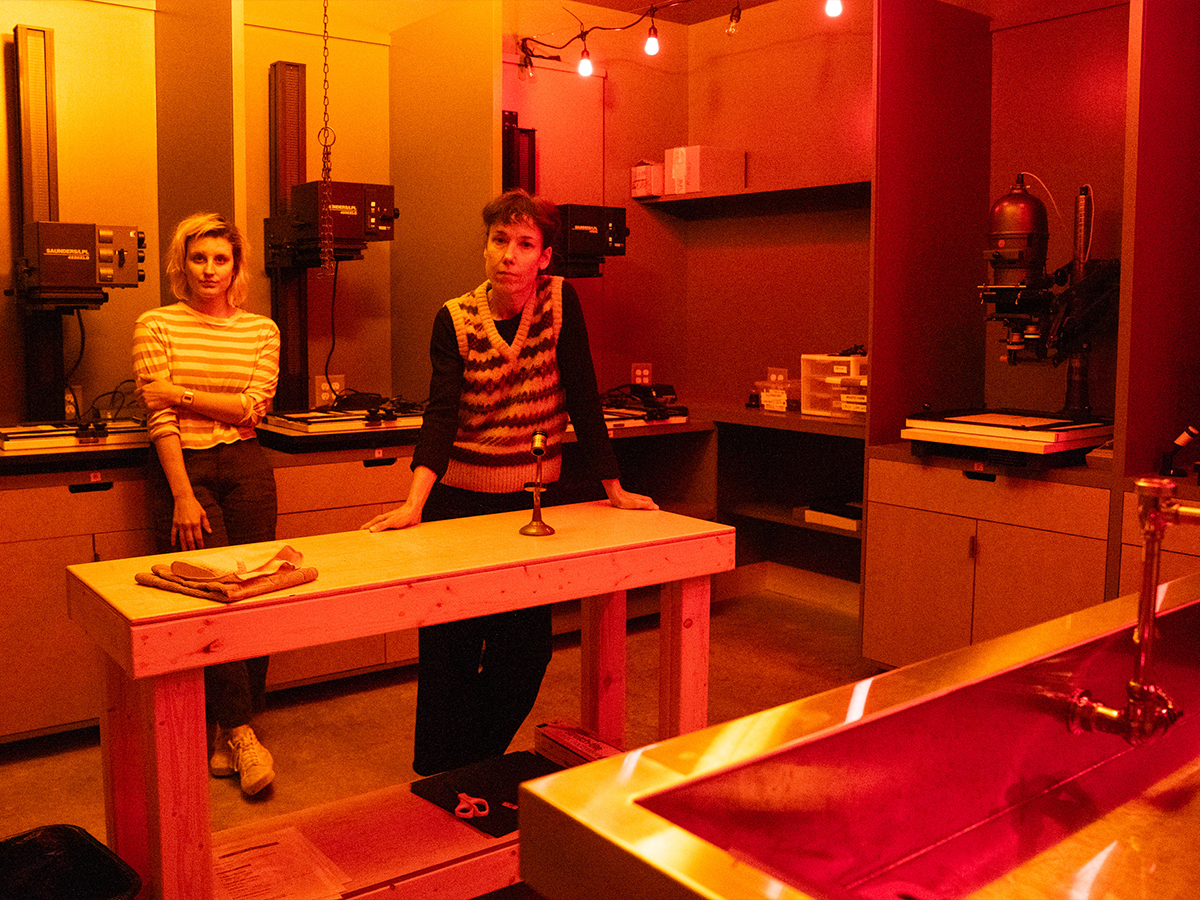 Photo of Rachel Jessen and Phyllis B. Dooney in the PHOTO FARM darkroom. Photo by Angelica Edwards.