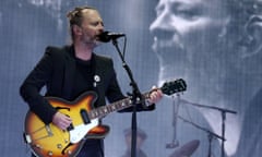 Thom Yorke from Radiohead performing on stage