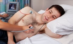 A male patient undergoes an ECG