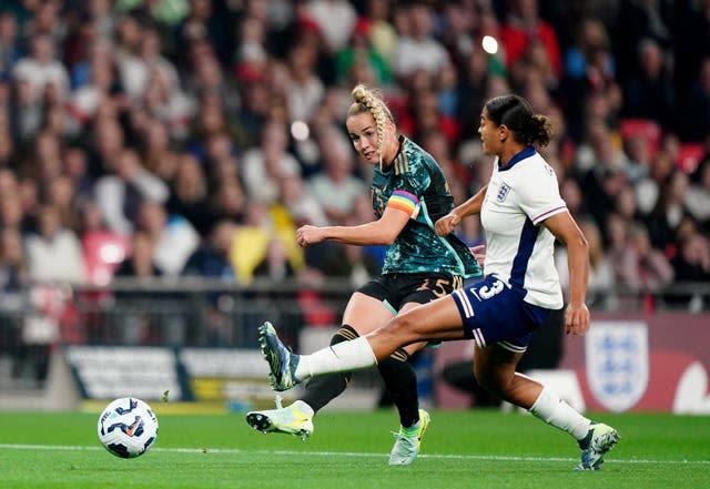 Germany’s Giulia Gwinn, left, scores her second goal against England