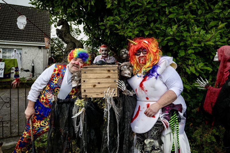 Con Prout, John A Murphy and Dotty Duggan getting into the spirit. 