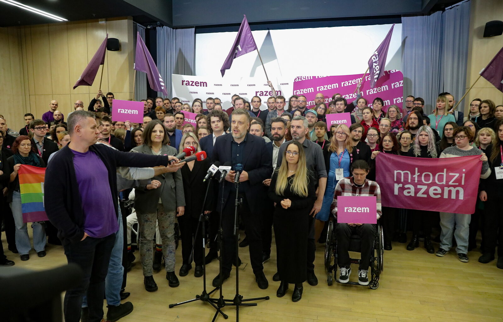 Adrian Zandberg (centre), co-chair of the Razem party, along with party members Maciej Konieczny (second from right), Marta Stożek (fifth from right) and Marcelina Zawisza (third from right), as well as Kraków city councilor Aleksandra Owca (fourth from right), during a press conference held by Razem party leaders and MPs in Warsaw, October 27.