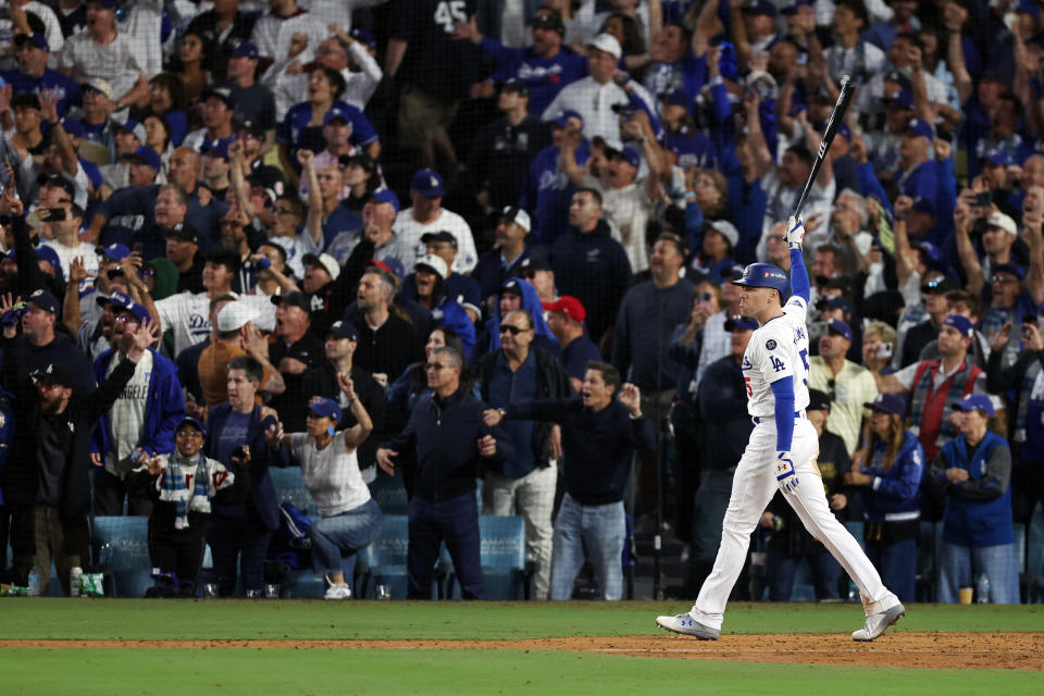 LOS ANGELES, CA - OCTOBER 25: Freddie Freeman #5 of the Los Angeles Dodgers watches the flight of his walk-off grand slam in the 10th inning during Game 1 of the 2024 World Series presented by Capital One between the New York Yankees and the Los Angeles Dodgers at Dodger Stadium on Friday, October 25, 2024 in Los Angeles, California. (Photo by Rob Leiter/MLB Photos via Getty Images)