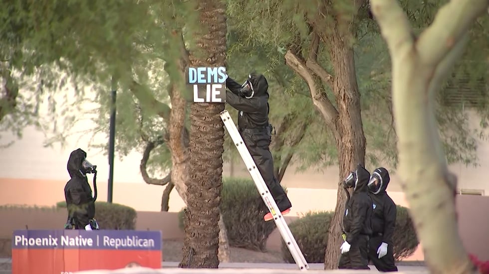 Political signs and an unknown powdered substance were found at multiple locations in Ahwatukee.