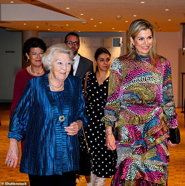 Máxima wore a multi-coloured midi dress by Indian-born, London-based brand Saloni while her mother-in-law opted for a vibrant, royal blue tunic top made with glittery thread